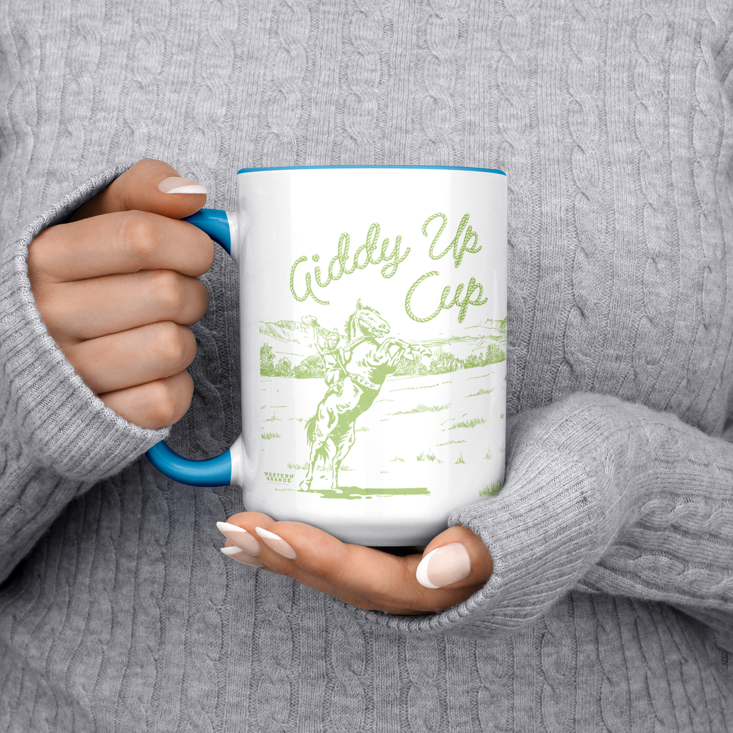 GIDDY_UP_CUP_-BLUE_MUG__GREEN_ART-_15oz_Lifestyle_LH_Chest_Mockup.png_15383354