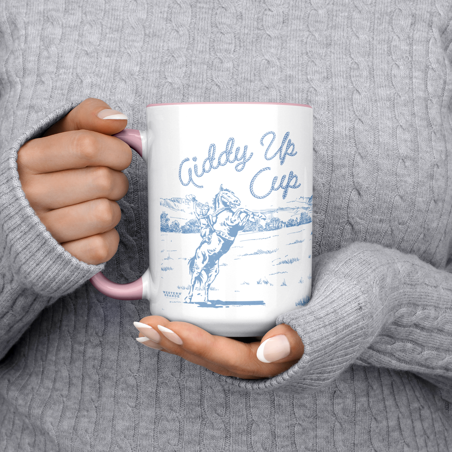 GIDDY_UP_CUP_-PINK_MUG__BLUE_ART-_15oz_Lifestyle_LH_Chest_Mockup.png_15383364